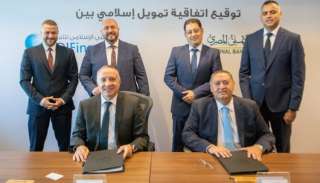 توقيع اتفاقية تمويل إسلامي بين البنك الأهلي المصري وشركة أبوظبي الإسلامي للتمويل
